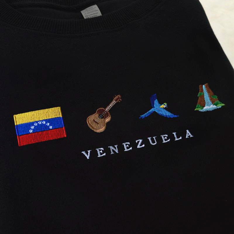 Venezuela Embroidery Sweatshirt, Cozy, Black, Angel Falls, Cuatro, Guacamaya, Arepa, Salto Angel, Guitar, Flag, Emoji, Venezuelan, Venezolano, Gift, Symbol Stitch, Caracas, Maracaibo, Joropo, Pana, Chamo, Hallacas, Ladilla, Symbol Stitch Crewneck Unisex